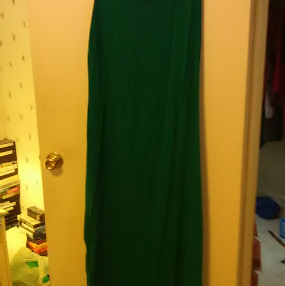 Green sleeveless dress with matching jacket